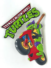 Load image into Gallery viewer, Playmates TMNT Donatello store display front view with motorcycle accessory.
