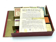 Load image into Gallery viewer, Folded Monopoli game board inside the box, showcasing its condition.
