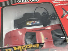 Load image into Gallery viewer, Top view of vintage Ferrari F40 reel controlled car highlighting Ferrari branding.
