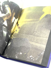 Load image into Gallery viewer, Spine and edge view of the 2001 Tomb Raider diary.
