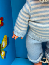 Load image into Gallery viewer, Full view of Furga Tino Ride doll boxed, emphasizing its complete presentation.
