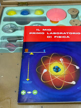 Load image into Gallery viewer, Close-up detail of the science kit box with colorful packaging and science illustrations.
