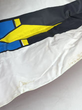 Load image into Gallery viewer, Detail of a flag with diagonal stripes in white, blue, yellow, and black
