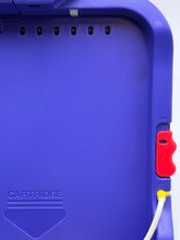 Carica l'immagine nel visualizzatore di Gallery, Detail shot of a purple container with handle and drainage holes.

