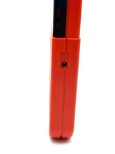 Load image into Gallery viewer, Detail view of the button on the red Grillo Parlante.
