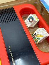 Load image into Gallery viewer, Close-up detail of Grillo Parlante toy keyboard interior with textured surface.

