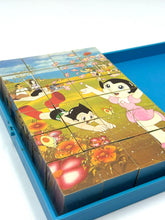 Load image into Gallery viewer, Opened Mighty Atom cube showing mini play environment with Astro Boy artwork
