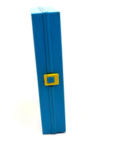 Load image into Gallery viewer, Side view of blue rectangular Mighty Atom cube with yellow accents
