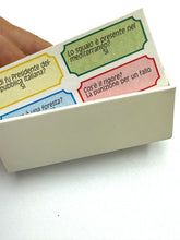 Load image into Gallery viewer, Detail of colorful game cards with rectangular shapes.
