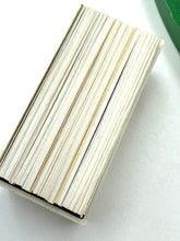 Load image into Gallery viewer, Close-up of a stack of cards with a striped design.
