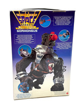 Load image into Gallery viewer, Back view of Gormongus packaging showcasing illustrated graphics and text descriptions.
