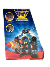 Load image into Gallery viewer, Mattel Gormongus packaging view featuring blue and red colors with brand logo.
