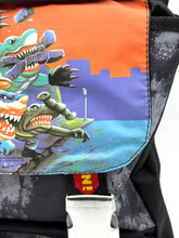 Load image into Gallery viewer, Detail shot of the Street Sharks backpack showcasing its design.
