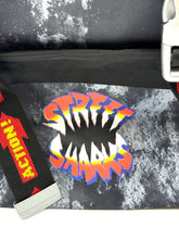 Load image into Gallery viewer, Interior view of the unused 1996 Street Sharks backpack in excellent condition.
