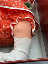 Load image into Gallery viewer, Detail of Fiba Chou Chou Rosebonbon Magnum doll's baby leg with patterned fabric.
