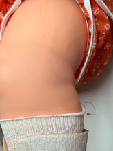 Load image into Gallery viewer, Detail of Fiba Chou Chou Rosebonbon Magnum doll's baby leg with patterned fabric.
