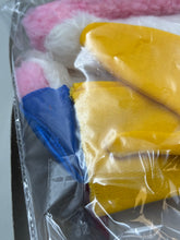 Load image into Gallery viewer, Detail shot of colorful fabric pieces with various textures.
