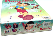 Load image into Gallery viewer, Detail view of the Pinocchio costume box showcasing colorful graphics

