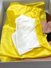 Load image into Gallery viewer, Detail view of various fabric pieces from the Pinocchio costume
