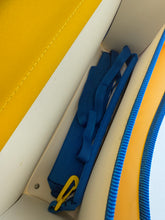 Load image into Gallery viewer, Interior view showing multiple pockets and flaps of the Digimon school folder.
