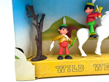Load image into Gallery viewer, Detail close-up of two figures and tree accessory from the playset.
