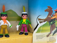 Load image into Gallery viewer, Detail of two toy figures in playful poses with feathered hats.

