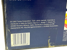 Load image into Gallery viewer, Close-up of Parker‑Tonka MB branding on the Dynamite game box
