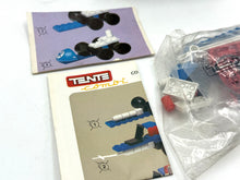 Load image into Gallery viewer, Various game materials including instruction manuals and plastic pieces
