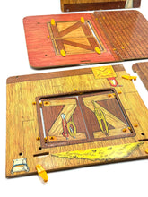 Carica l'immagine nel visualizzatore di Gallery, Close-up of barn detail in the Sunshine Family Farm playset showing colorful accessories
