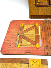 Carica l'immagine nel visualizzatore di Gallery, Close-up of barn detail in the Sunshine Family Farm playset emphasizing colorful accessories
