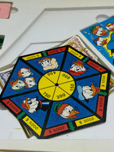 Carica l'immagine nel visualizzatore di Gallery, Detail of the octagonal spinner board featuring character images
