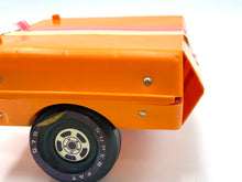 Load image into Gallery viewer, Side view of the orange toy trailer with a two-tone design.
