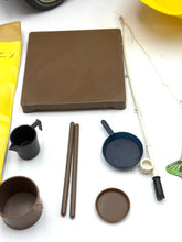 Load image into Gallery viewer, Close-up of various brown kitchen items including utensils and measuring spoon
