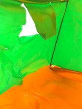 Load image into Gallery viewer, Mattel Big Jim Camping Tent detail close-up of smooth green and orange fabric with colorful interior

