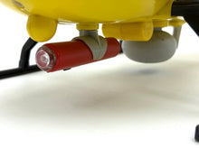 Load image into Gallery viewer, Front view of the yellow helicopter with red accessory and landing gear.
