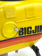 Load image into Gallery viewer, Close-up of the yellow helicopter showcasing the BIG JIM logo and circular detail.
