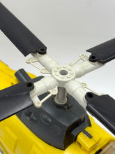 Load image into Gallery viewer, Close-up of the rotor blades and central hub of the yellow helicopter.
