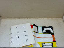 Load image into Gallery viewer, Detail of the box interior showing insert tray and instruction sheet
