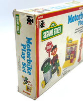 Load image into Gallery viewer, Original box of Sesame Street Motorbike Playset showing wear and front design.
