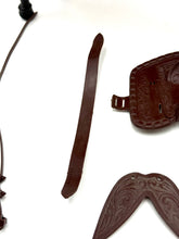 Load image into Gallery viewer, Detail shot of various brown accessories with detailed textures.
