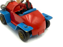 Load image into Gallery viewer, Side view of Politoys W5 Goofy Car displaying vintage details and visible wheels.
