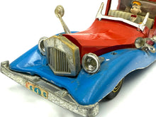 Load image into Gallery viewer, Detail view of Politoys M559 Uncle Scrooge Car highlighting the front grille and driver figure.
