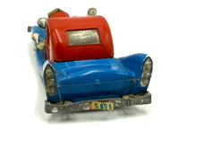 Load image into Gallery viewer, Detail view of the interior of Politoys M559 Uncle Scrooge Car with driver figures and dashboard.
