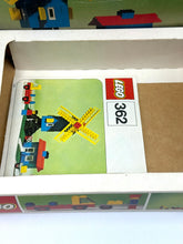Carica l'immagine nel visualizzatore di Gallery, Top view of LEGO instruction manual with illustrated cover
