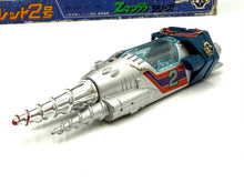 Carica l'immagine nel visualizzatore di Gallery, Side view of the gray and blue toy spaceship highlighting pointed nose and exhaust details.

