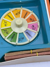 Carica l'immagine nel visualizzatore di Gallery, Scommettiamo color wheel featuring yellow, orange, green, and purple segments.
