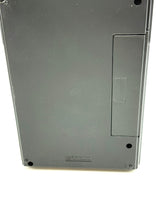 Carica l'immagine nel visualizzatore di Gallery, Side view of the Tomy device showing button and grip details.
