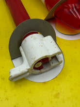 Carica l'immagine nel visualizzatore di Gallery, Close-up of the red and white circular mechanical part.
