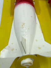 Carica l'immagine nel visualizzatore di Gallery, Detail view of the white and red rocket tip with slight wear.
