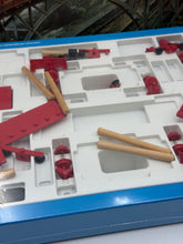 Load image into Gallery viewer, Detail view of Fischertechnik Bau-Spiel-Bahn Train Playset components with organized layout.
